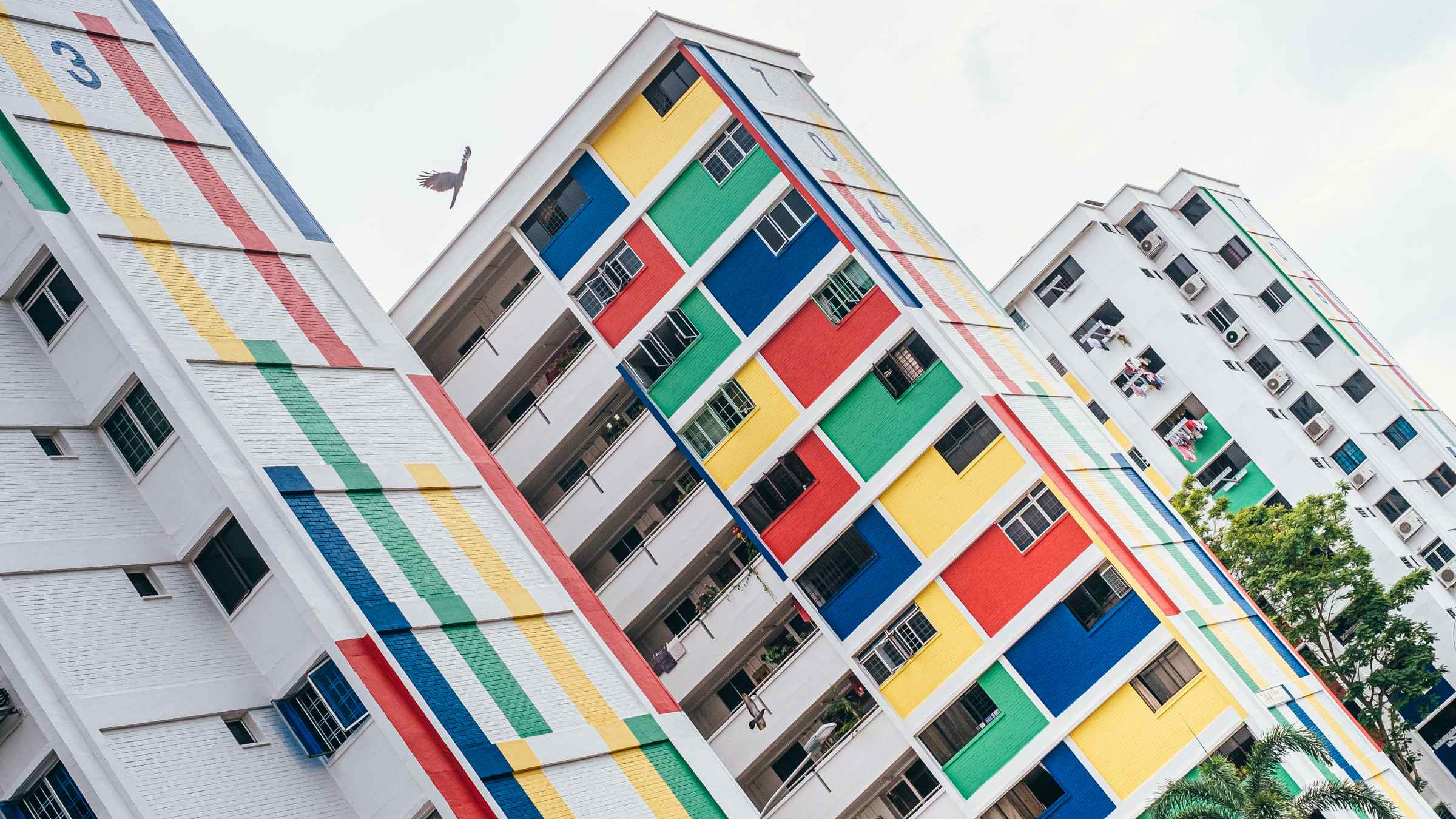 Colourful HDBs line the quaint neighbourhood of Chong Pang Green HDB.