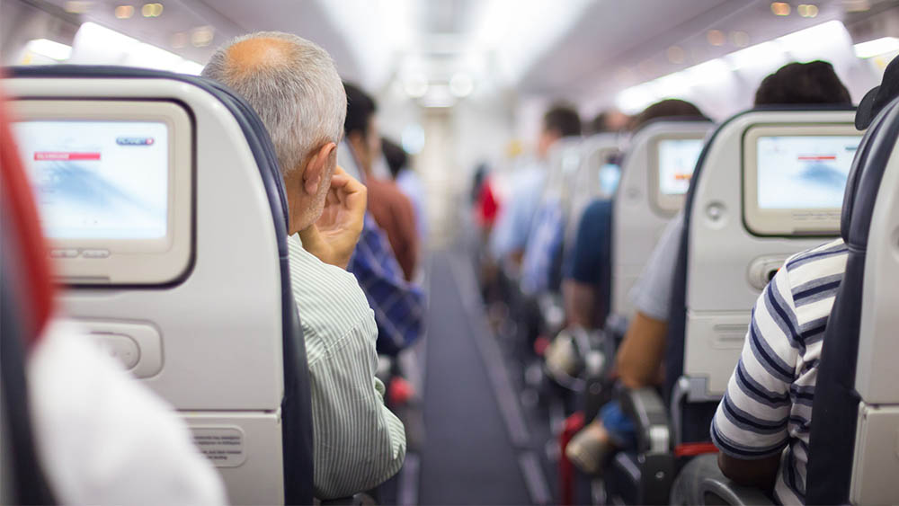 Travelling with elderly parents on an airplane for family holidays