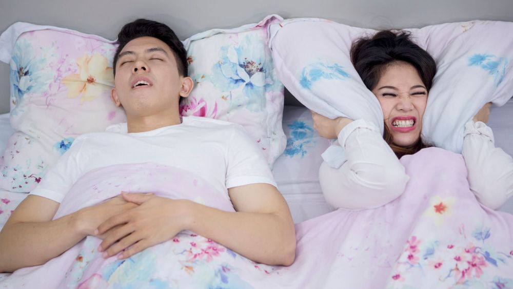 Sleeping separately as a couple may seem counterintuitive, but it brought peace back to this writer's marriage.
