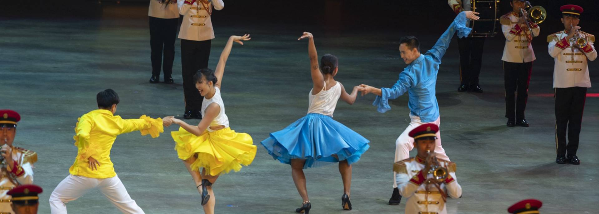 Dancers from the Music & Drama Company (MDC) performing at an event.