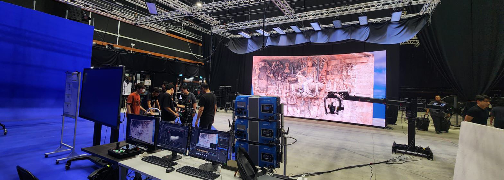 Virtual production studio, a filmmaking environment with large-scale LED walls to create immersive digital backgrounds.